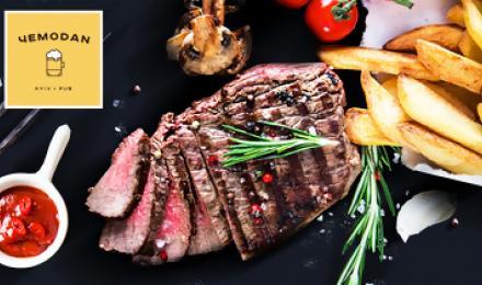 МЕСТО ДЛЯ ДУШЕВНЫХ ВСТРЕЧ! Скидка 30% на все меню кухни и бара: мясные и рыбные стейки, закуски, пицца, деруны и многое другое от кафе-ресторана "Чeмodan Pub"!